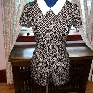 Fall romper with pockets.